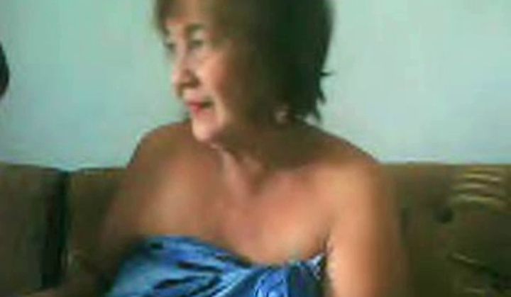 Hefty Granny Thai Chick On Camera Showing Goods On Camera
